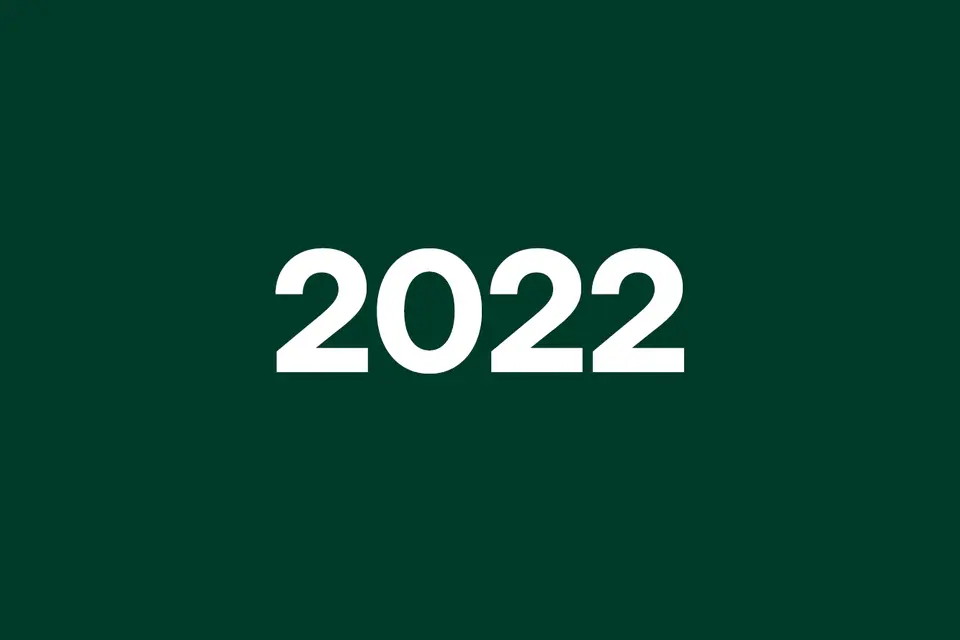 White "2022" text centered on a dark green background