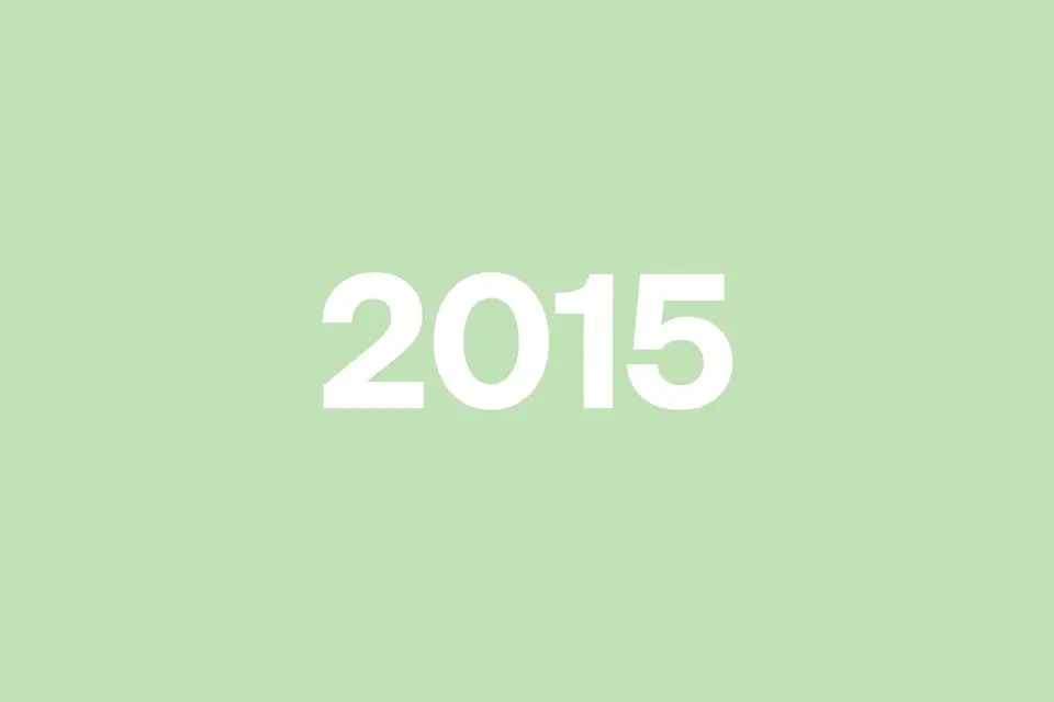 White "2015" text centered on a light green background