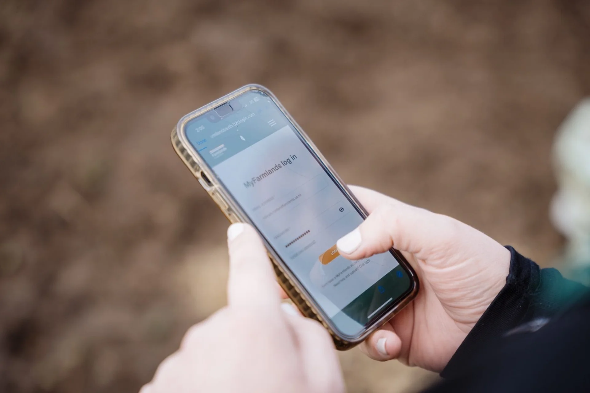 Become a Card Partner: Person using a smartphone outdoors, engaging with an app.
